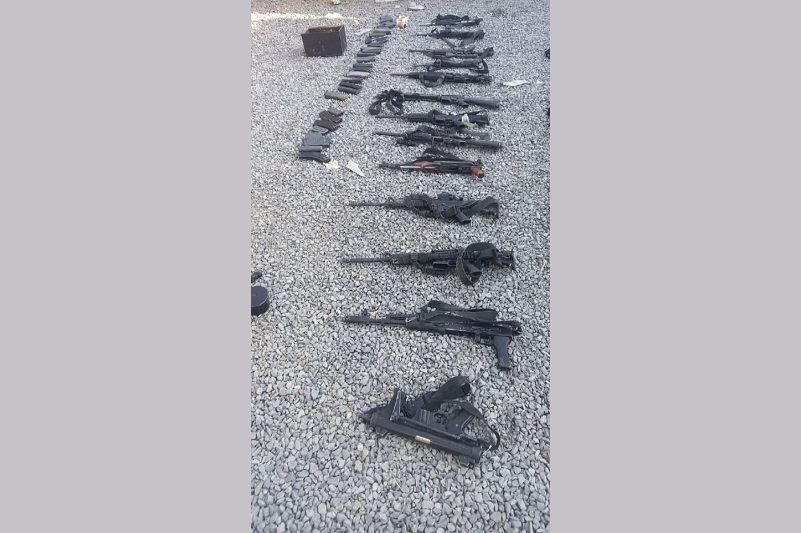 En Puebla aseguran rifles de asalto, granadas y cartuchos útiles a nueve personas presuntamente relacionadas con el crimen organizado. (Especial)
